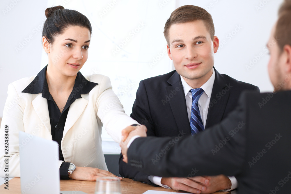 Business people at meeting in office background. Successful negotiation of business team or lawyers Business people at meeting in office background. Successful negotiation of business team or lawyers