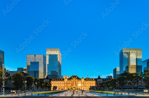 View of Marunouchi side of Tokyo railway station in the Chiyoda City, Tokyo, Japan.  The station is divided into Marunouchi and Yaesu sides in its directional signage.