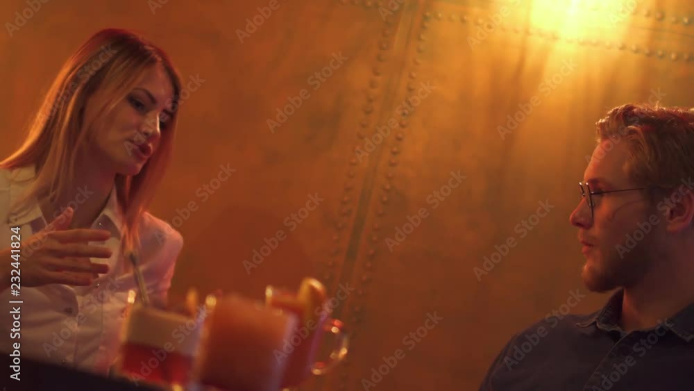 Young couple resting at a table in a cafe Young couple resting at a table in a cafe