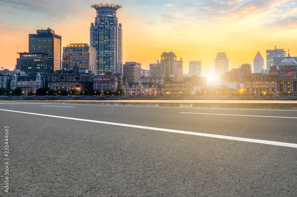 City skyscrapers and road asphalt pavement