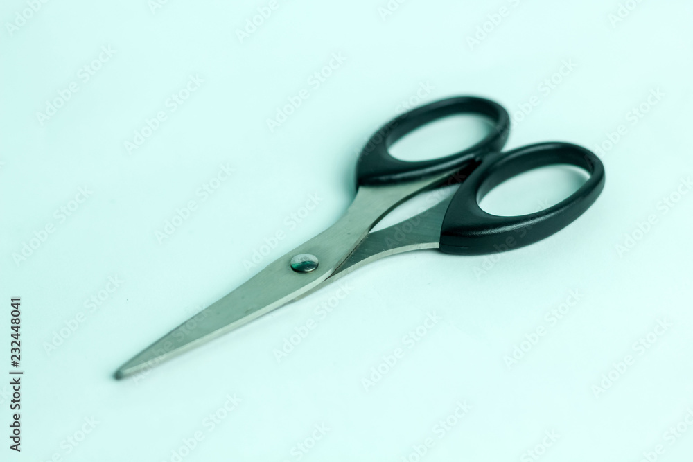 Isolated Metal Scissor with Black Plastic Handle Isolated Metal Scissor with Black Plastic Handle