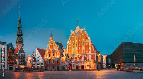 Riga, Latvia. Town Hall Square With St. Peter's Church, Schwabe  photo