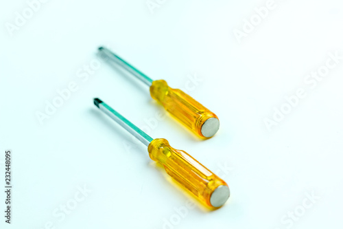 Isolated Close up Yellow Screwdriver on a White Background
