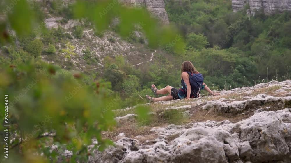 Girl climber walks in the mountains Girl climber walks in the mountains