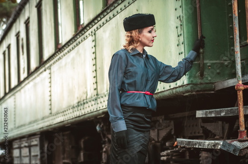 Retro woman on the train station