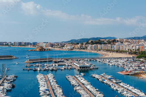 Panoramic aerial view of Blanes in Costa Brava in a beautiful summer day, Spain © alserikov
