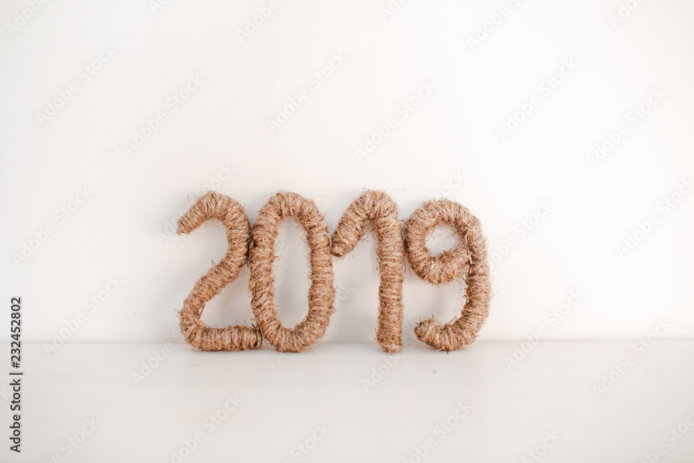 Christmas and happy new year decor with 2019 numbers on white background Christmas and happy new year decor with 2019 numbers on white background