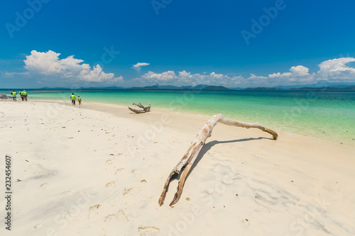 White sand beach and Long-tail boat at Khang Khao Island (Bat island), The beautiful sea Ranong Province, Thailand. © PRASERT