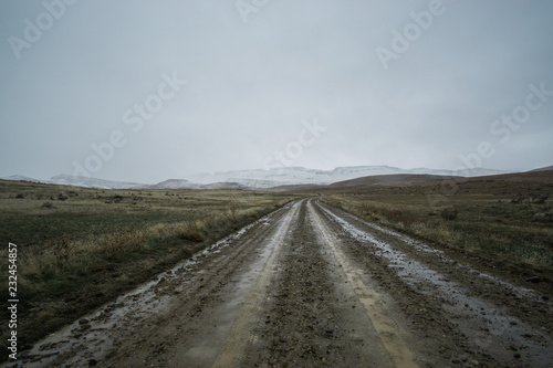 Wet dirt road through the desert in Eastern Oregon, USA