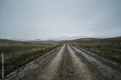 Wet dirt road through the desert in Eastern Oregon, USA