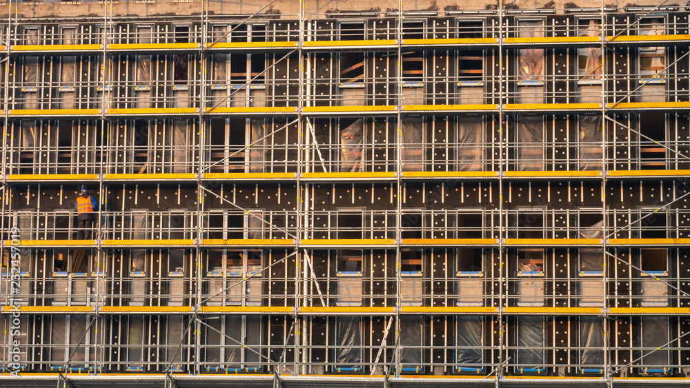 Scaffolding system in construction. Texture background.