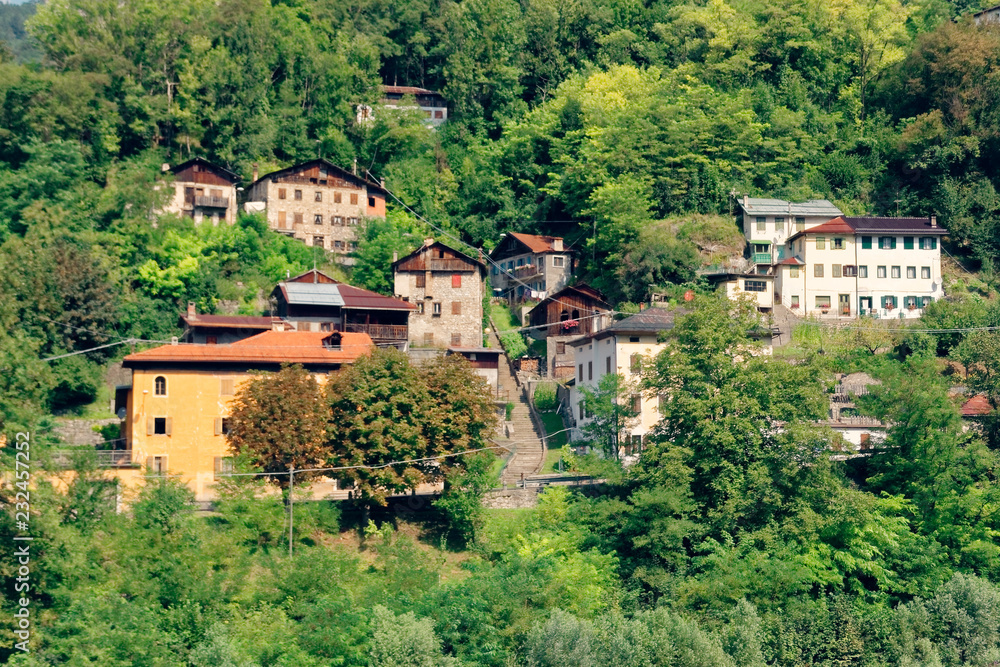 Beluno, Italy August 7, 2018: Perarollo di Cadore mountain village. Houses on the mountains.