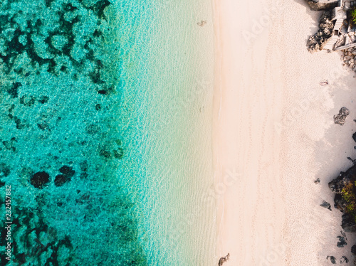 Aerial view of tropical beach with crystal turquoise ocean in Seychelles