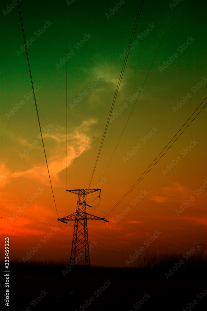 electric tower in the evening sky