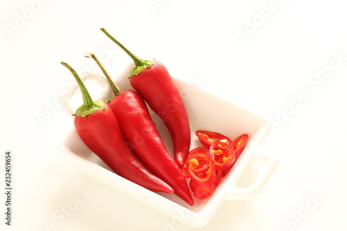 freshness chili pper on white dish with copy space photo