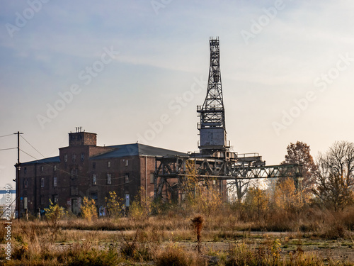 Ruins of abandoned building and crane. Post apocalyptic/nuclear fallout image.