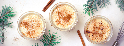 Eggnog, Traditional Christmas Drink, Cocktail with Cinnamon and Nutmeg for Winter Holidays photo