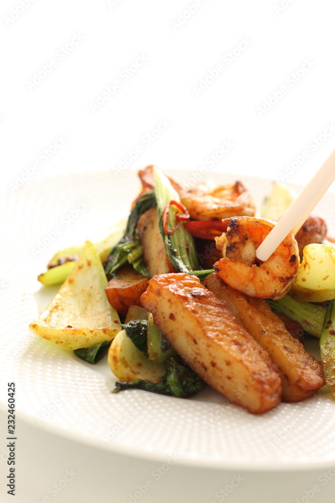 Asian food, chili pepper stir fried with prawn and celery Asian food, chili pepper stir fried with prawn and celery