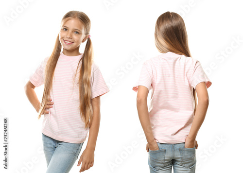 Little girl in t-shirt on w...