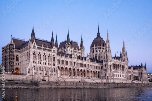 Hungarian parliament in Budapest on the Danube river © vitfotography