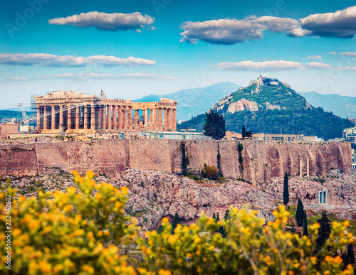 Great spring view of Parthenon, former temple, on the Athenian Acropolis, Greece, Europe. Colorful morning scene in Athens. Treveling concept background. Artistic style post processed photo.