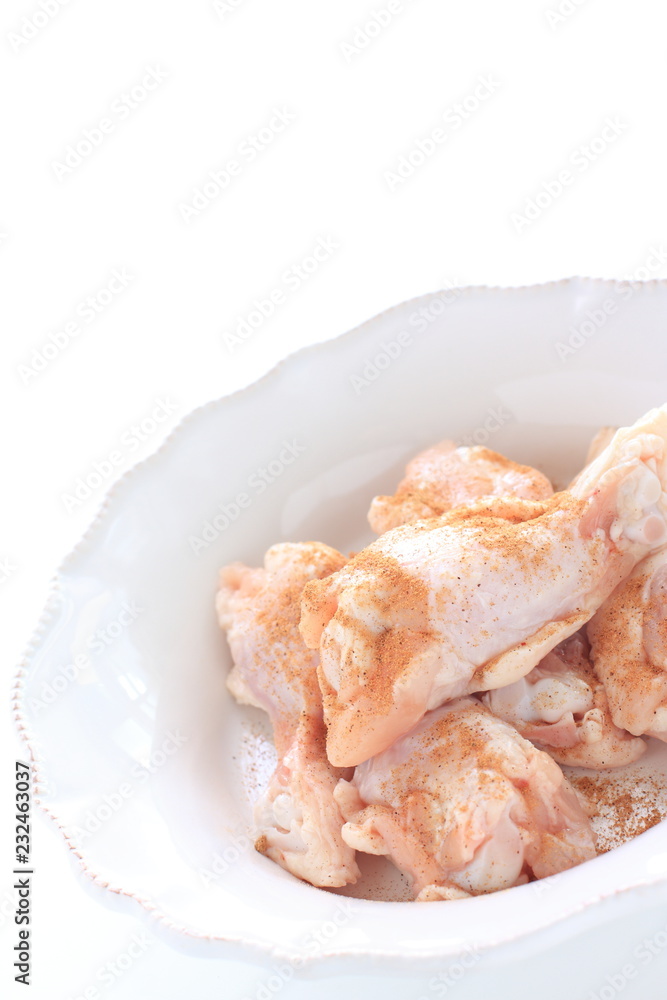 Cumin powder and chicken drumsticks for cooking image Cumin powder and chicken drumsticks for cooking image