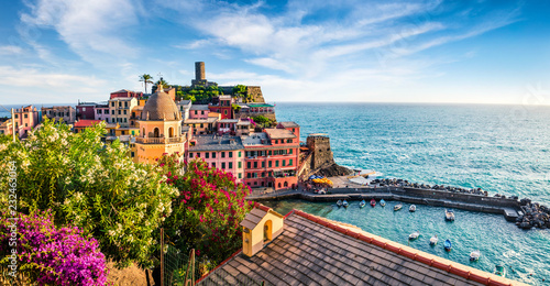 One of the five towns that make up the Cinque Terre region - Vernazza. Colorful spring morning in Liguria, Italy, Europe. Picturesqie seascape of Mediterranean sea. Traveling concept background.