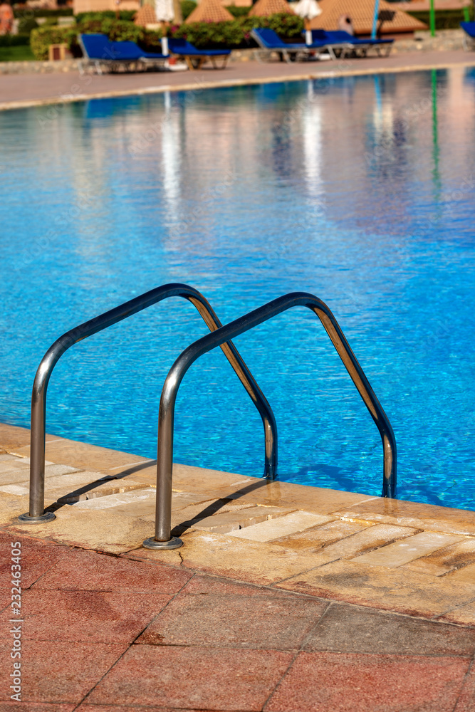 Swimming Pool with a Steel Ladder