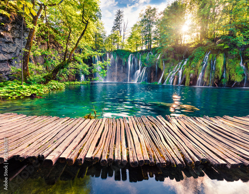 Picturesque morning view of Plitvice National Park. Colorful spring scene of green forest with pure water waterfall. Great countryside landscape of Croatia, Europe.