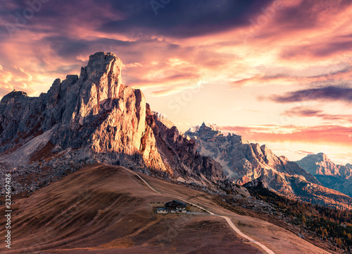 Breathtaking morning view from the top of Giau pass with famous Ra Gusela, Nuvolau peaks in background. Colorful autumn scene of Dolomite Alps, Cortina d'Ampezzo location, Italy, Europe.
