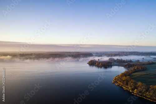 Morning mist on the banks of big lake © MichaelB