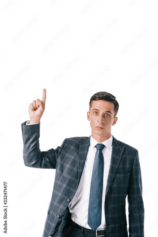 portrait of businessman in suit pointing up isolated on white portrait of businessman in suit pointing up isolated on white