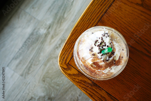 Coffee break time at  coffee shop.Top view of Mocha coffee cup.