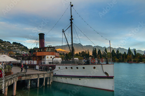 Canvas Print Sunset in Queenstown wharf with steamship attraction on lake Wakatipu, the famou
