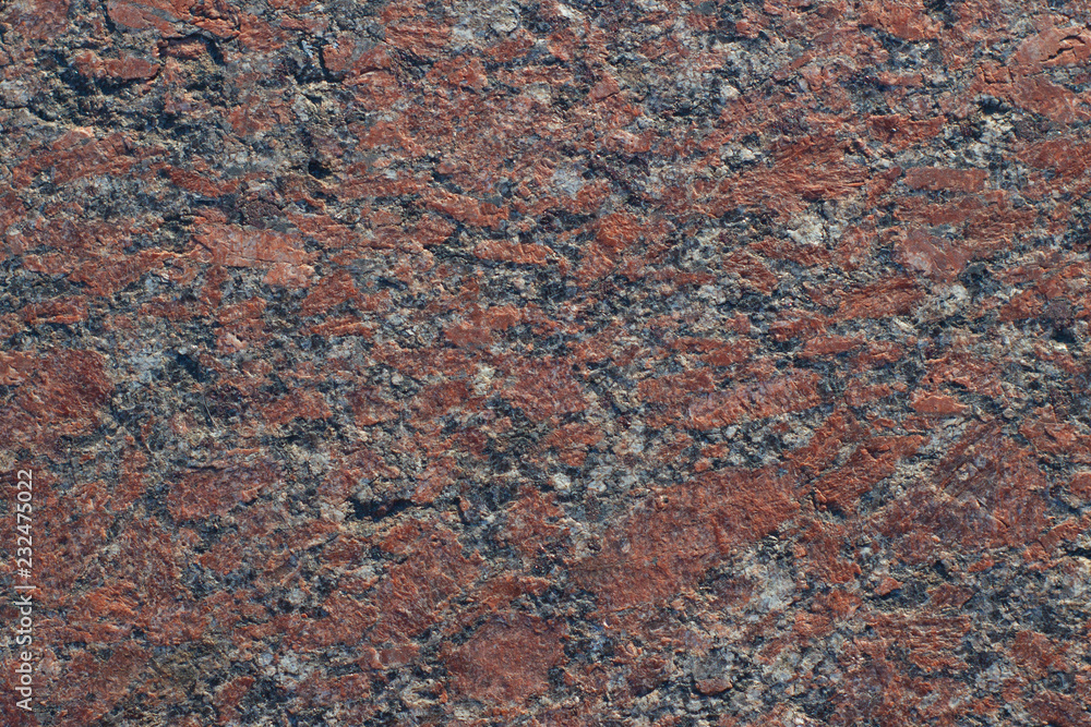 Red granite, which is used in construction. Red granite, which is used in construction.
