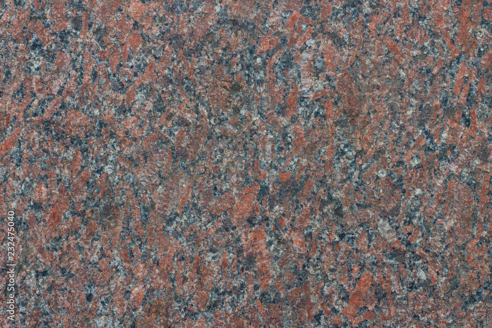 Red granite, which is used in construction. Red granite, which is used in construction.