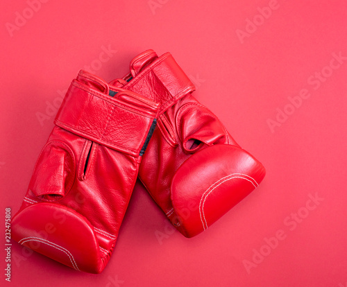 Wallpaper Mural red sport leather boxing gloves on a red background Torontodigital.ca
