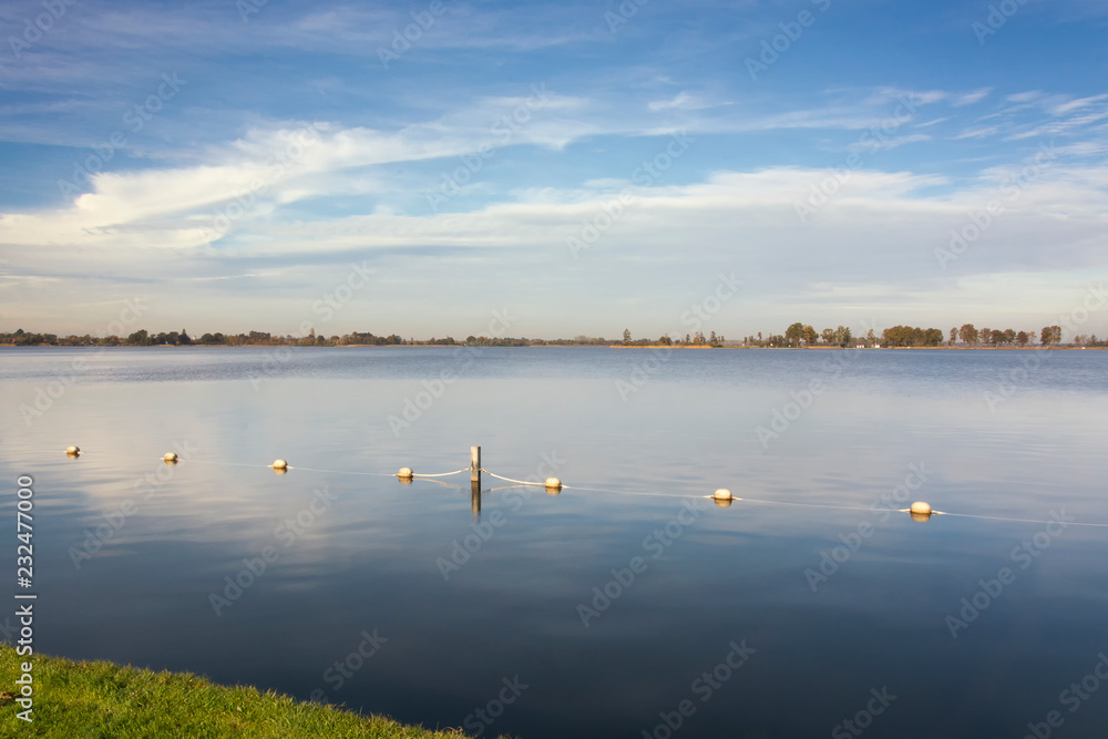 View on the Loosdrechtse plassen, the Netherlands. An area with several connected beautiful lakes,  Ideal for boating, swimming, aquatics, relaxing and enjoying a waterrich environment