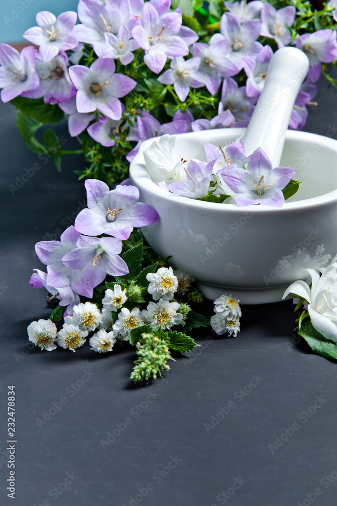 Spa background with flowers. Hygiene items for bath and spa.