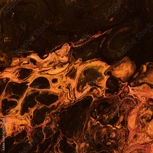 Very beautiful textural background. Dark brown paint flows in a yellow-orange color with the addition of pink paint. The style includes curls of marble or pulsations of agate with bubbles and cells.
