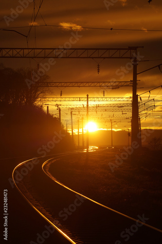 Setting sun on the railway