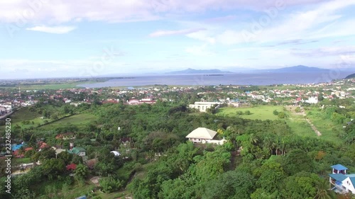 Los Baños, Laguna, Philippines - November 21, 2017: Mountain rainforest modern housing built. Drone Aerial photo