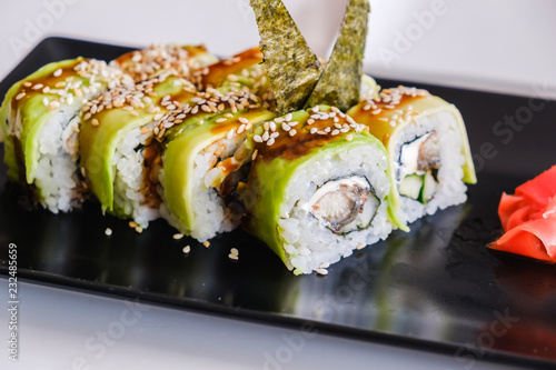 Sushi roll with eel and avo...