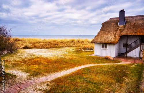 Path to the house in the dunes of the Baltic Sea. photo