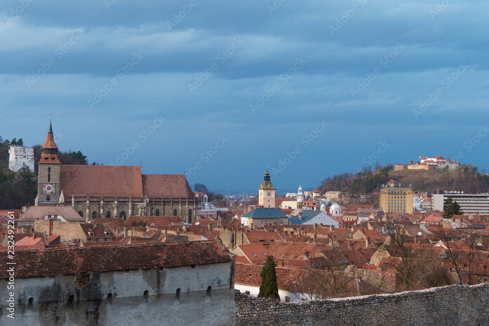 Iconic view of Brasov with 3 of the most important towers: Black Church, Council Square and the fortress of Brasov