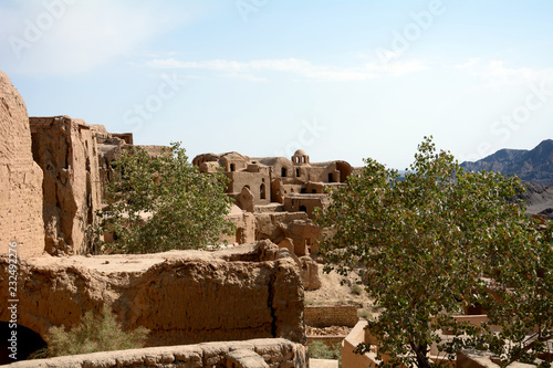 Ruins of anabandoned medieval village, Kharanaq, Iran photo