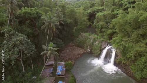 Bunga, Nagcarlan, Laguna, Philippines - November 12, 2017: Split, twin water falls in the middle of mountain forest. Drone aerial shot photo