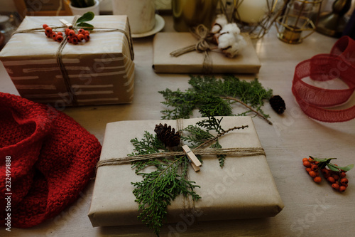 Classy Christmas gifts box presents on brown paper. Christmas presents with handmade decoration