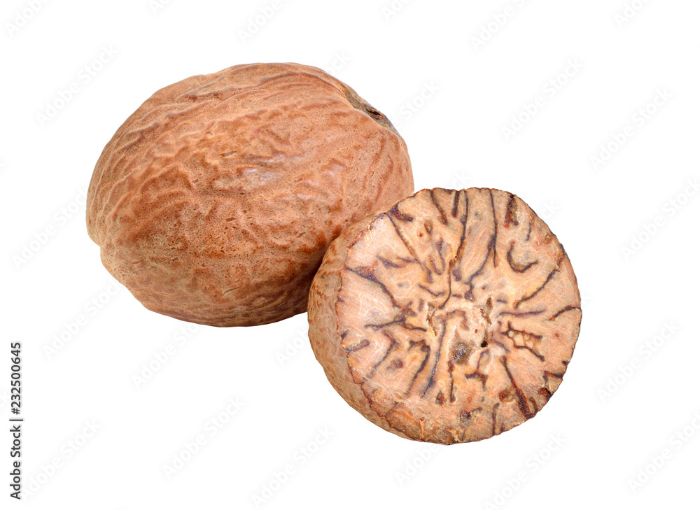 Nutmeg, fragrant nutmeg or true nutmeg. Whole nut and half. Isolated on white background Nutmeg, fragrant nutmeg or true nutmeg. Whole nut and half. Isolated on white background
