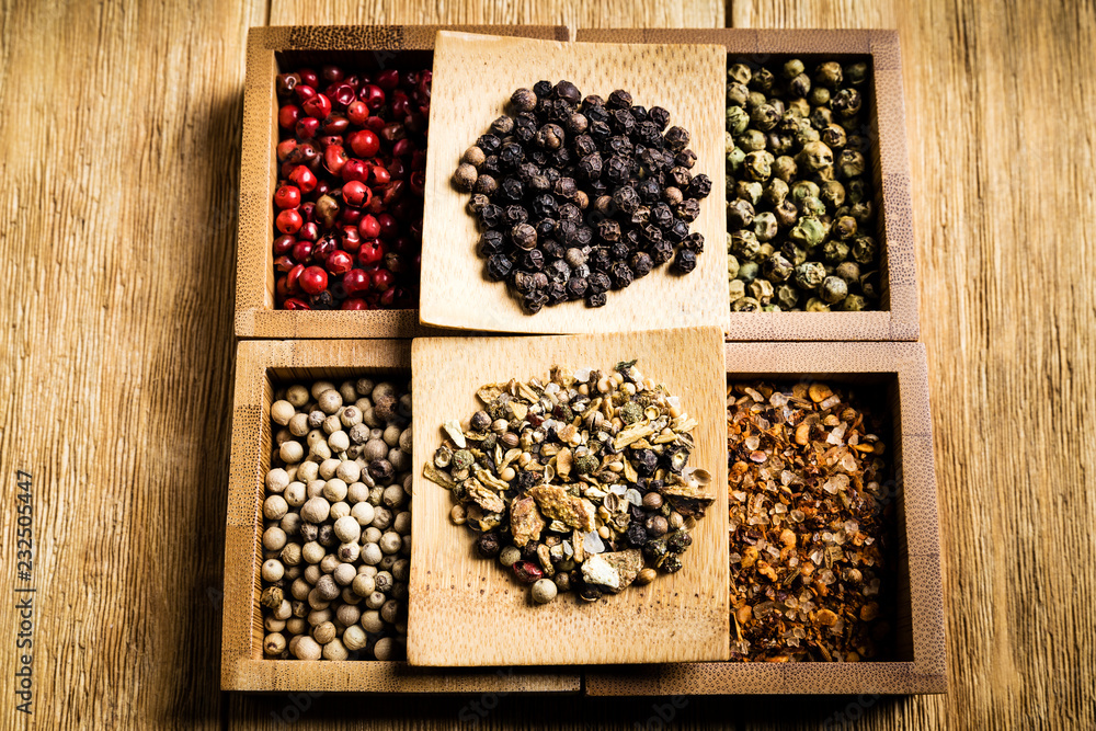 spices for a tasty meal on an old wooden table: red pepper, green pepper, black pepper, white pepper, ground chili, mixture of spices, salt
spices for a tasty meal on an old wooden table: red pepper, green pepper, black pepper, white pepper, ground chili, mixture of spices, salt